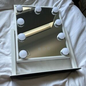 Small light up vanity mirror